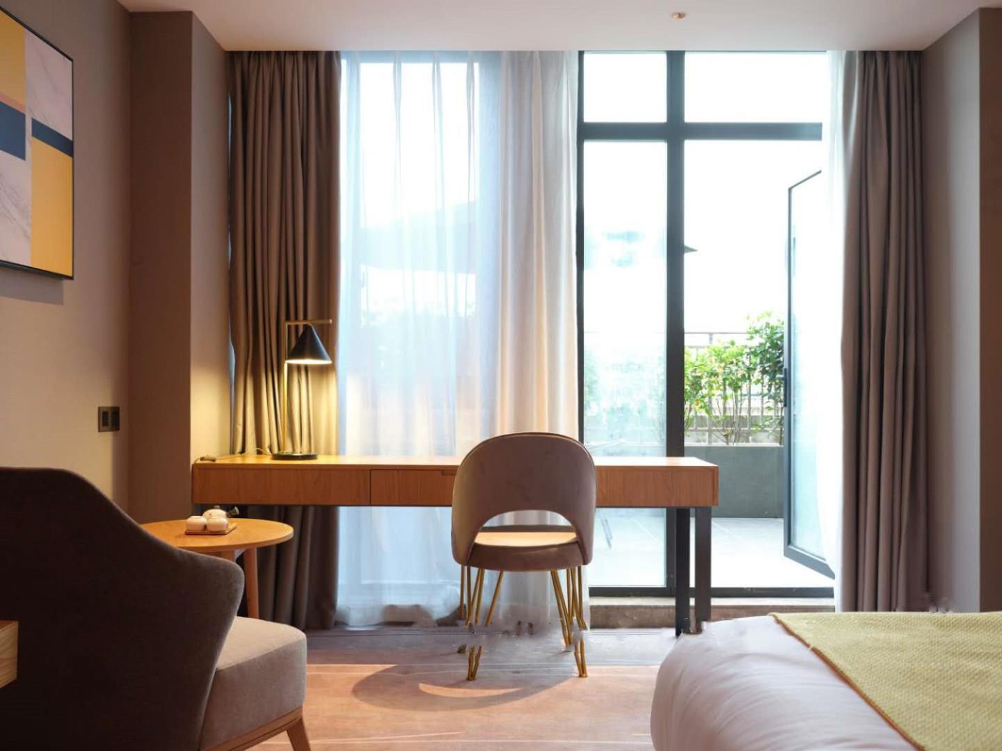 Baian Art Hotel Luzhou Exterior foto